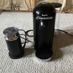 Nespresso coffee machine with froth